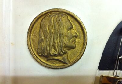 antique piano with emblem of Franz Liszt